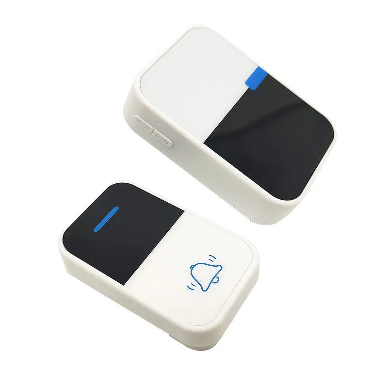 White plastic wireless doorbell receiver and transmitter units on a plain background