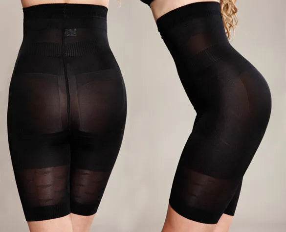 Women's black seamless high-waisted shapewear shorts for tummy control laid flat