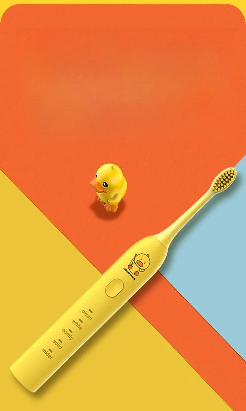 Yellow USB rechargeable electric toothbrush with small duck design and soft bristles