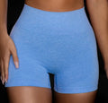 Short sleeve yoga suit set in knitted nylon with top and shorts, shown in blue