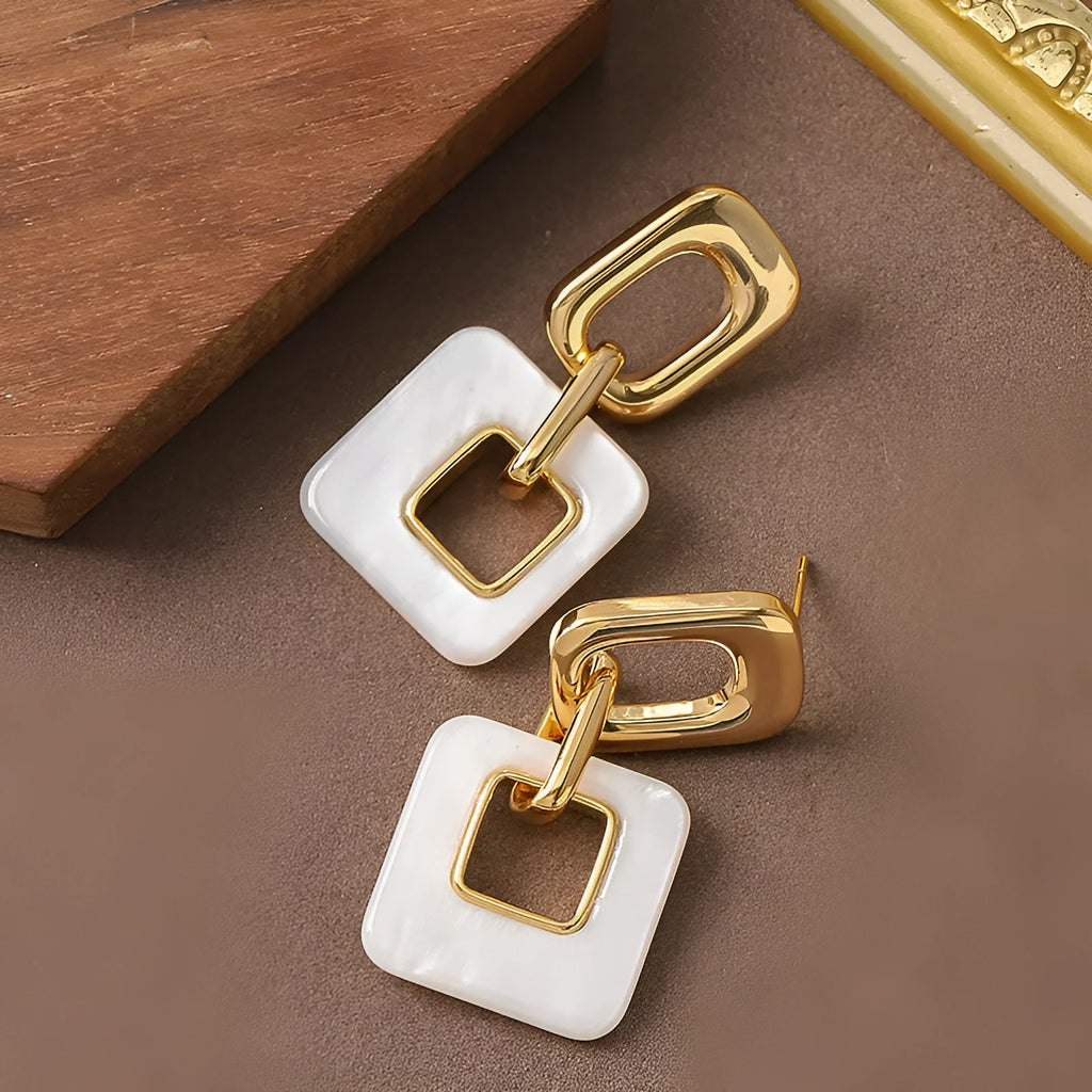 Copper geometric square earrings with hollow construction and chamfered pattern