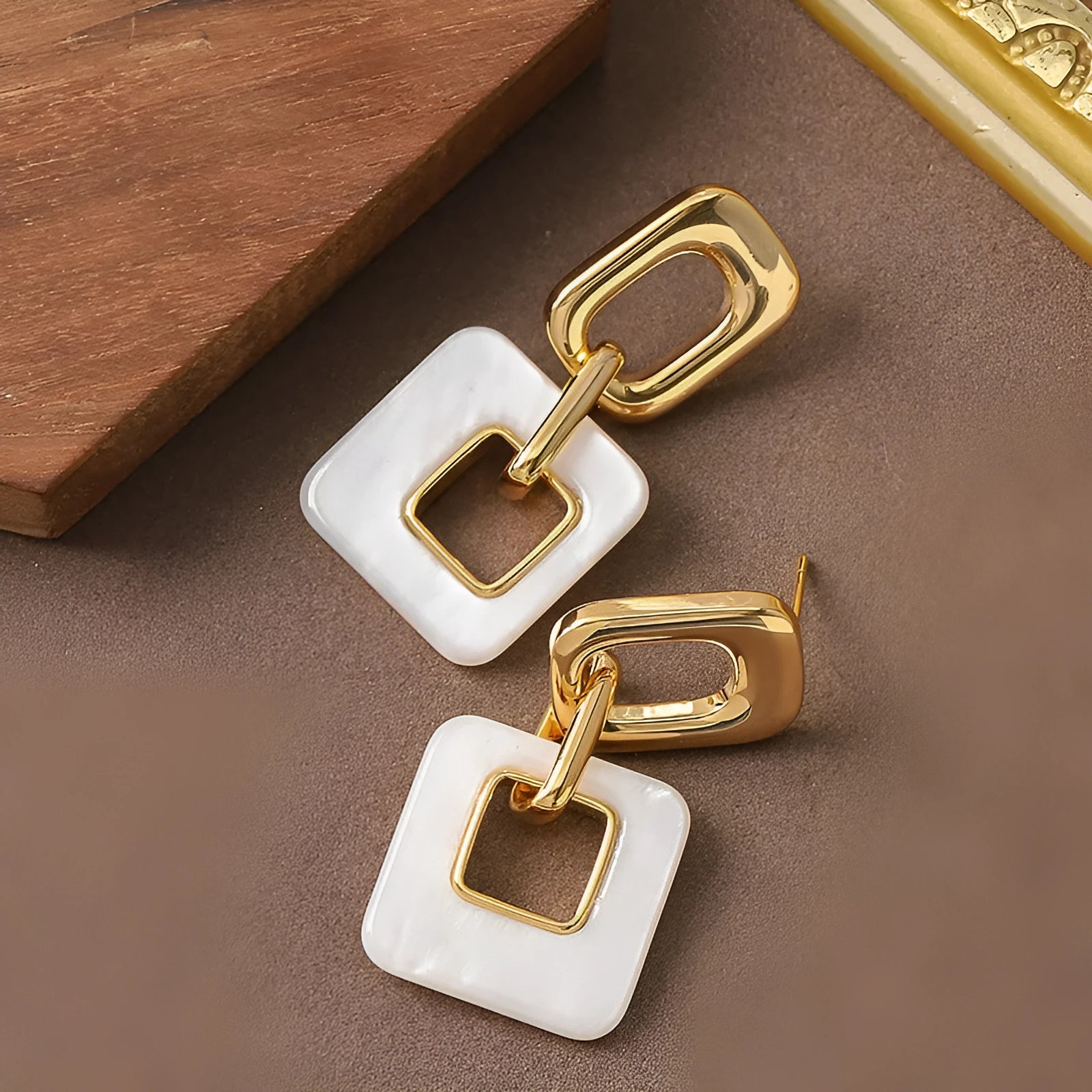 Copper geometric square earrings with hollow construction and chamfered pattern