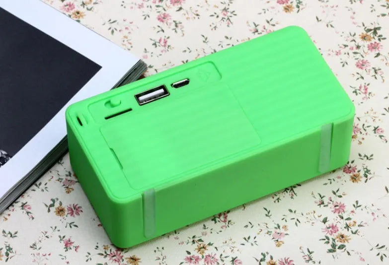 Cannon X3 cube Bluetooth speaker in five colour options showing compact block design with control buttons