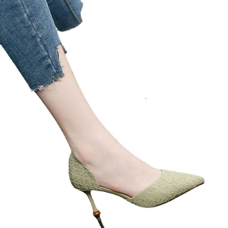 Women's black pointed toe stiletto high heel shoes with a 6-8cm heel and plain PU upper.