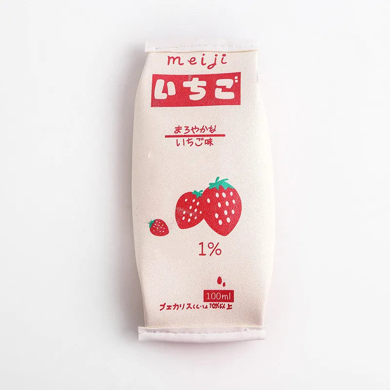 Leather pencil case shaped like a strawberry milk carton in pink colour on a white background
