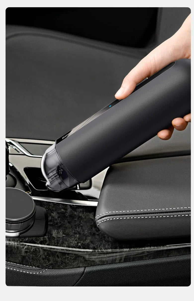 Compact handheld wireless car vacuum cleaner in black, white, or green, showing suction nozzle and blowing hose.
