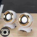 Compact black and gold USB-powered stereo desktop speakers for computers