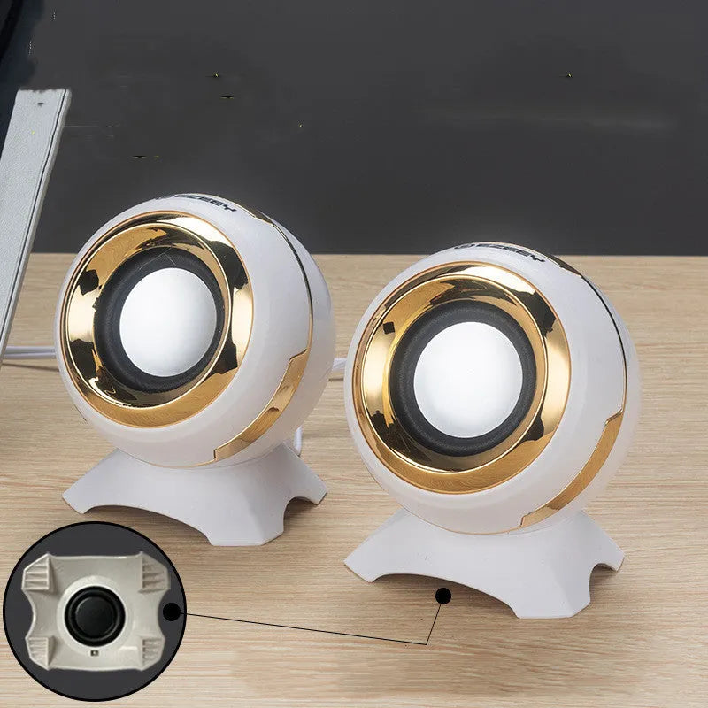 Compact black and gold USB-powered stereo desktop speakers for computers