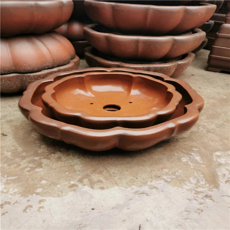 Round purple sand flower pot in red colour 35-40cm on desktop