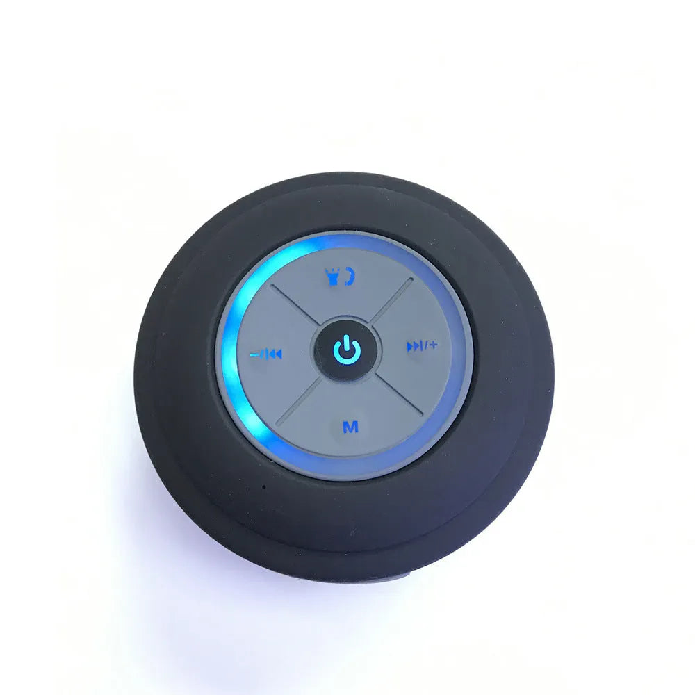 Mini waterproof Bluetooth speaker in blue with USB cable, plastic shell, 98x88x43mm size