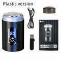 Black portable USB rechargeable shaver with LED display on a clean background.