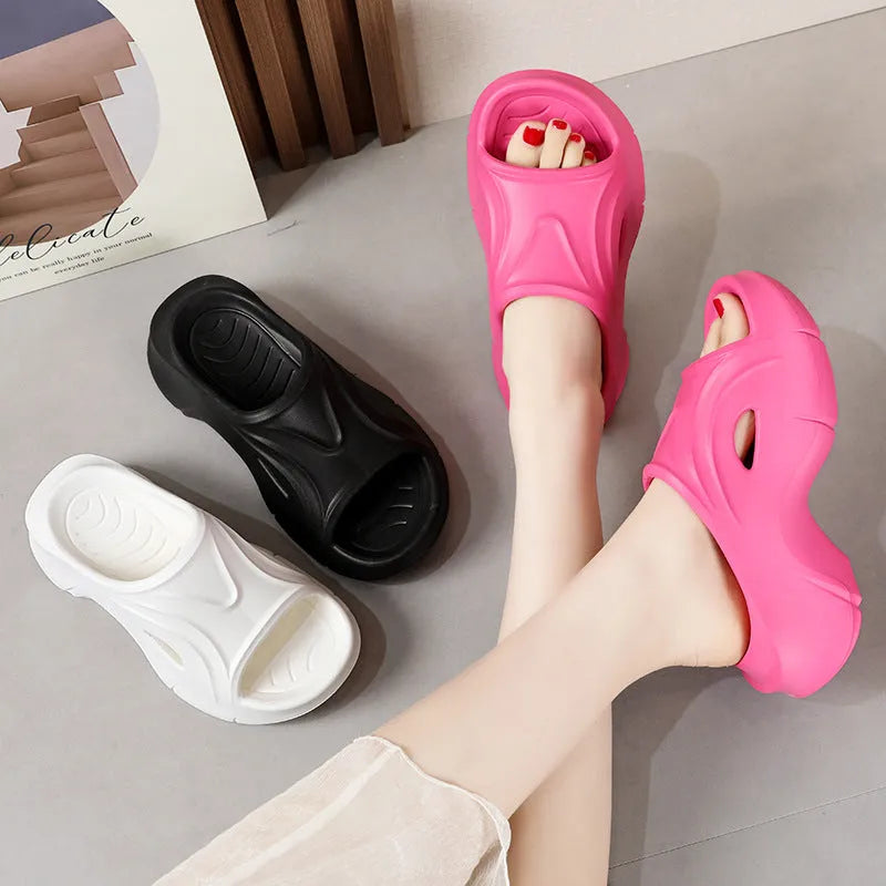 Women's thick-soled EVA slippers in white, black, or rose red with round toe design