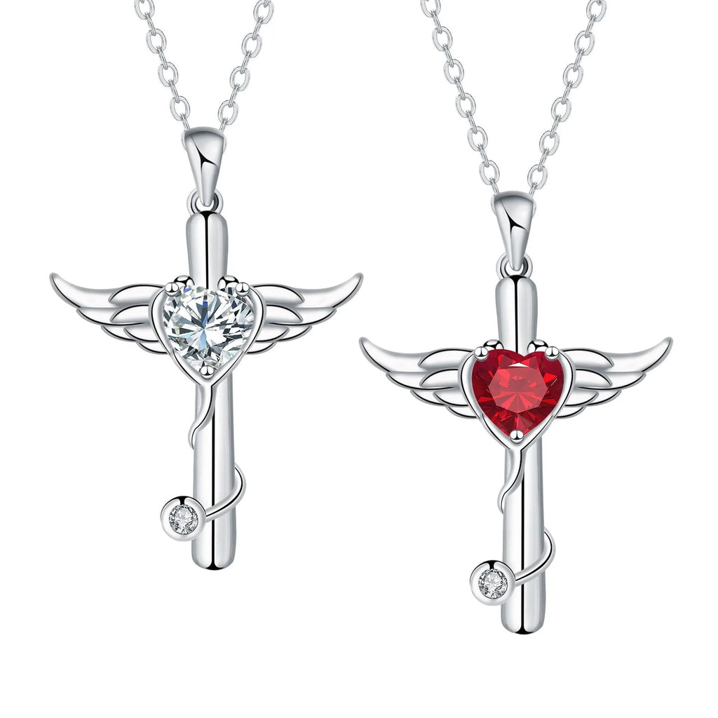 Close-up of a women's necklace with a charm combining a cross, stethoscope, and wings, in a choice of red or white electroplated finish.