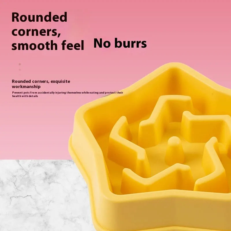 Yellow plastic dog slow feed bowl with pet-shaped obstacle inside