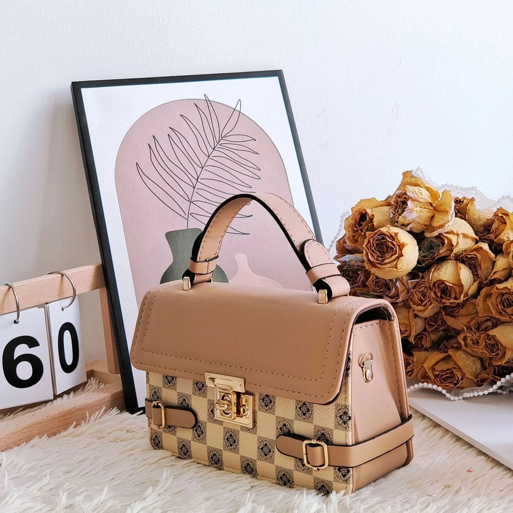 Retro patterned PU leather crossbody bag in a horizontal square shape on a white background.