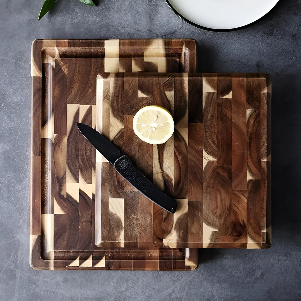 Brown solid wood chopping board with parquet pattern, shown on a kitchen countertop.