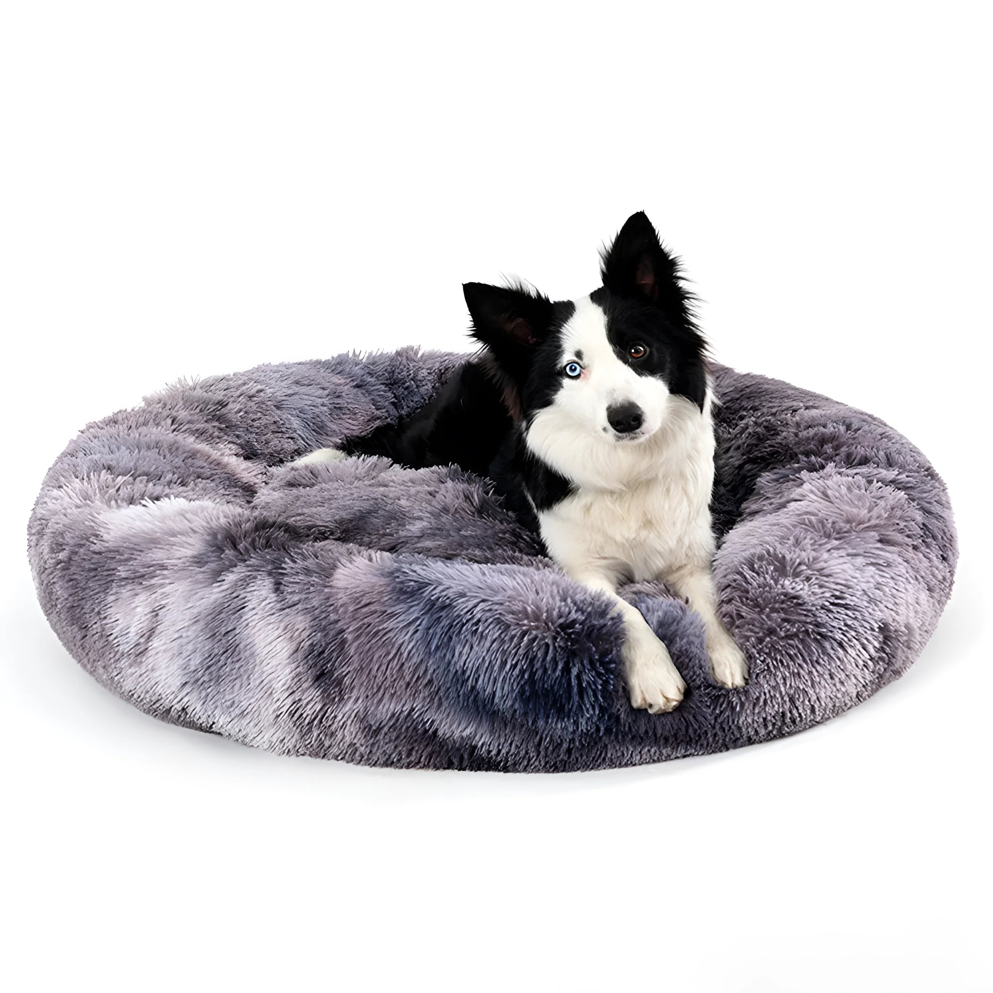 Fluffy donut-shaped dog bed in light grey plush material, showing raised rim and central cushion.