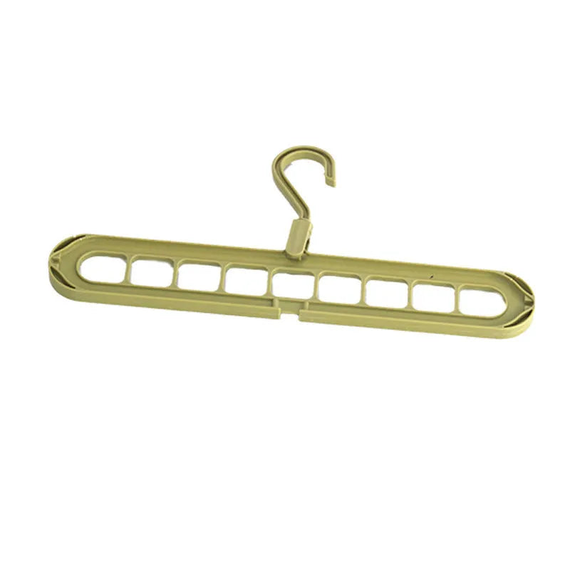 Plastic nine-hole hanger for folding trousers in beige, blue, green, grey, or pink.