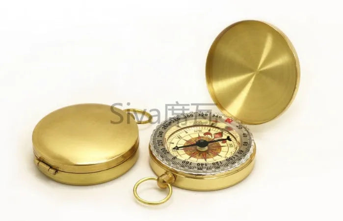Metal flip compass outdoor pocket watch compass gold colour copper-tone close-up