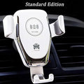 Black car Qi wireless charger with automatic clamp mounted on a vehicle air vent.