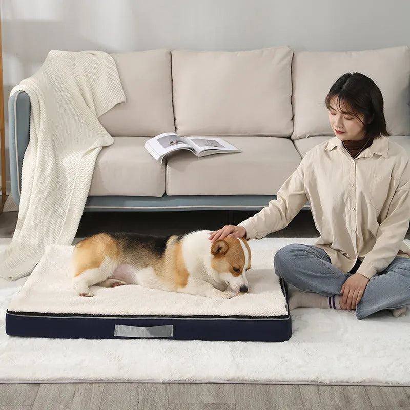 Brown removable cover memory foam dog mat showing size options on a wooden floor.