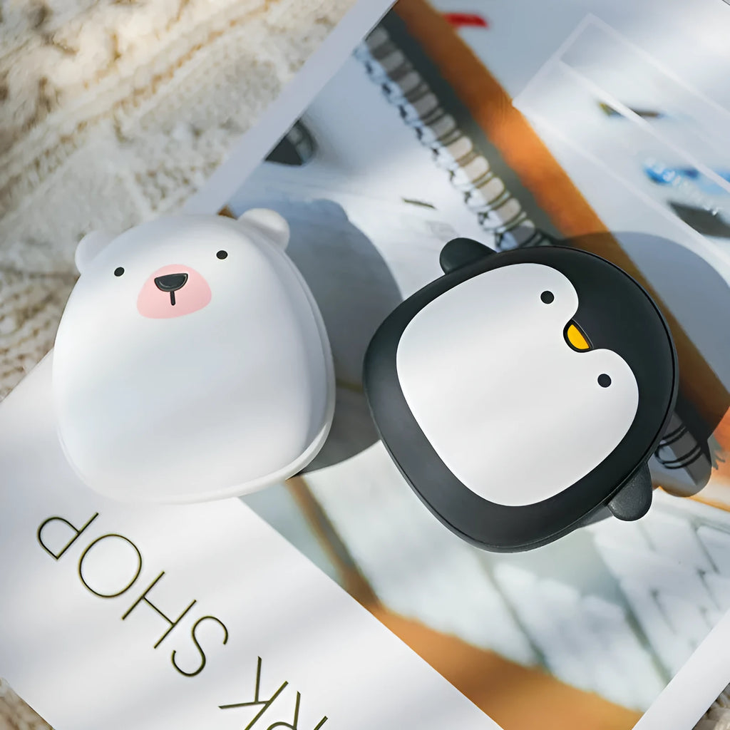 Cartoon penguin polar bear design USB rechargeable electric hand warmers showing front and side views