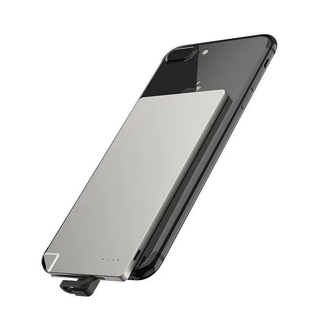 Ultra-slim silver graphene battery power bank 4000mAh on surface with cables