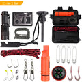 Black outdoor survival tool set box with compass, whistle, fire stick, carabiner, rope, and fishing accessories arranged on surface