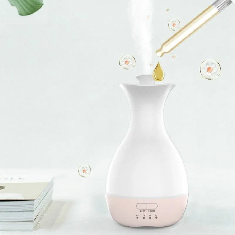 White ultrasonic humidifier and essential oil diffuser with colourful LED night light and 200ml water tank