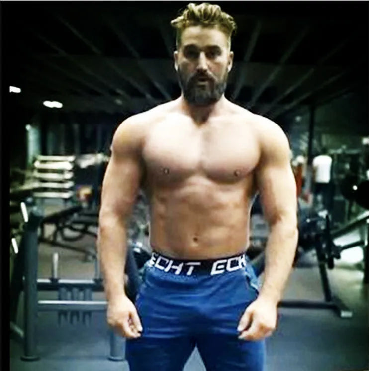 Cotton fitness sweatpants for men, black, with elastic waist, suitable for running and gym