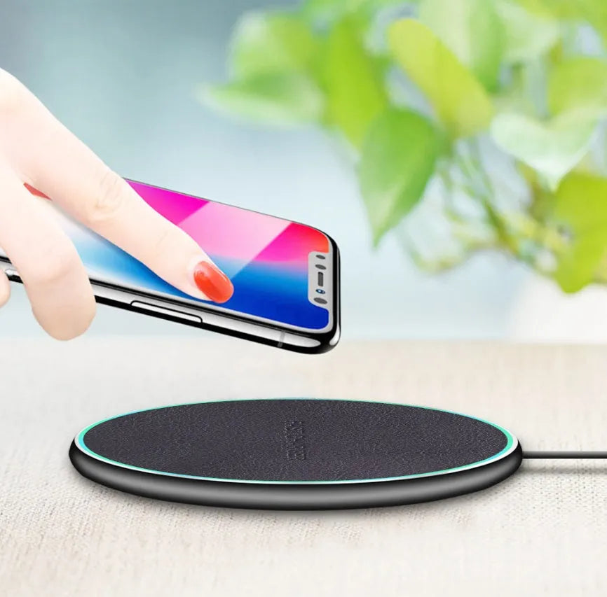 Black 15W Quick Qi wireless charging pad for iPhone 11 and Qi-compatible smartphones
