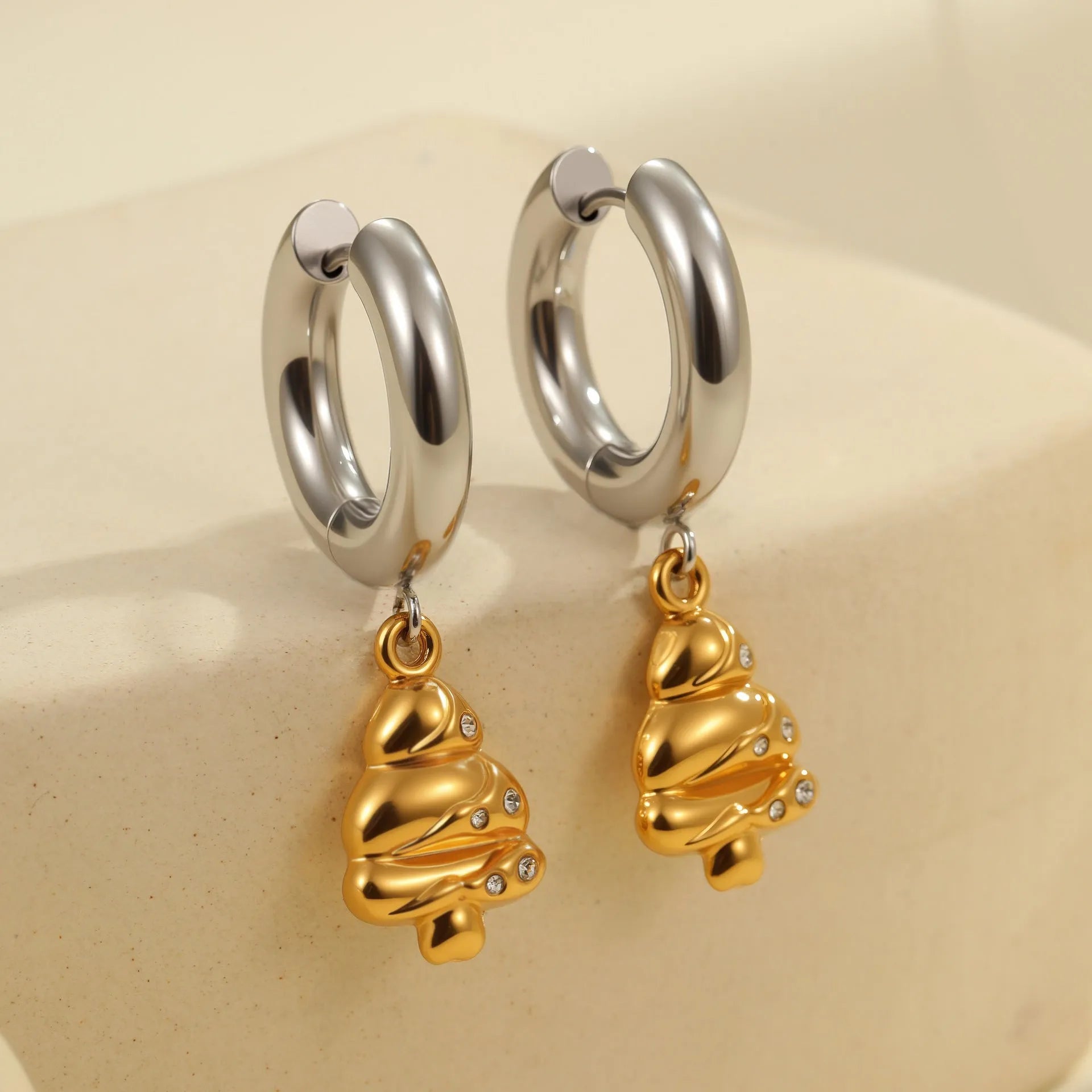 Women's stainless steel earrings with 18K gold electroplating in heart, star, and Christmas tree shapes