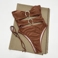 Nylon one-piece solid colour swimsuit for women in black, brown, or red sizes S M L for swimming and wading