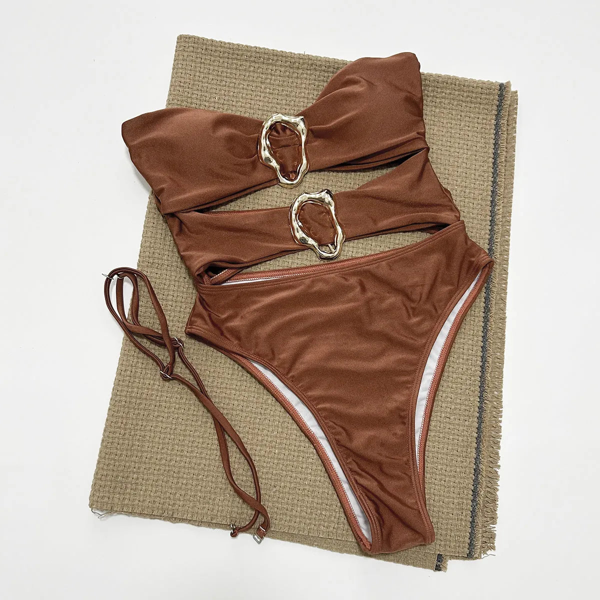 Nylon one-piece solid colour swimsuit for women in black, brown, or red sizes S M L for swimming and wading