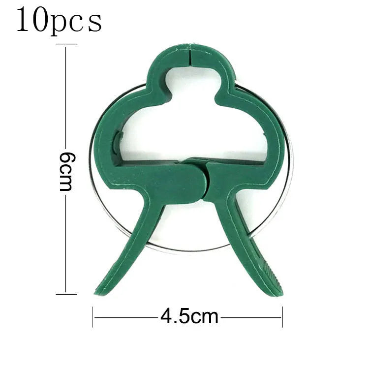 Green plastic plant fixing clips showing large and small sizes for supporting climbing garden plants