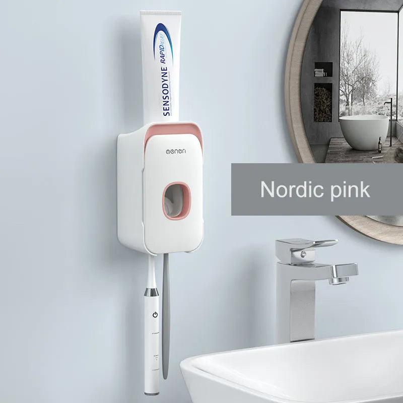 Automatic wall-mounted toothpaste dispenser in blue colour on a bathroom wall.