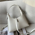 Soft genuine leather dumpling-shaped crossbody bag in apricot colour with visible stitching.
