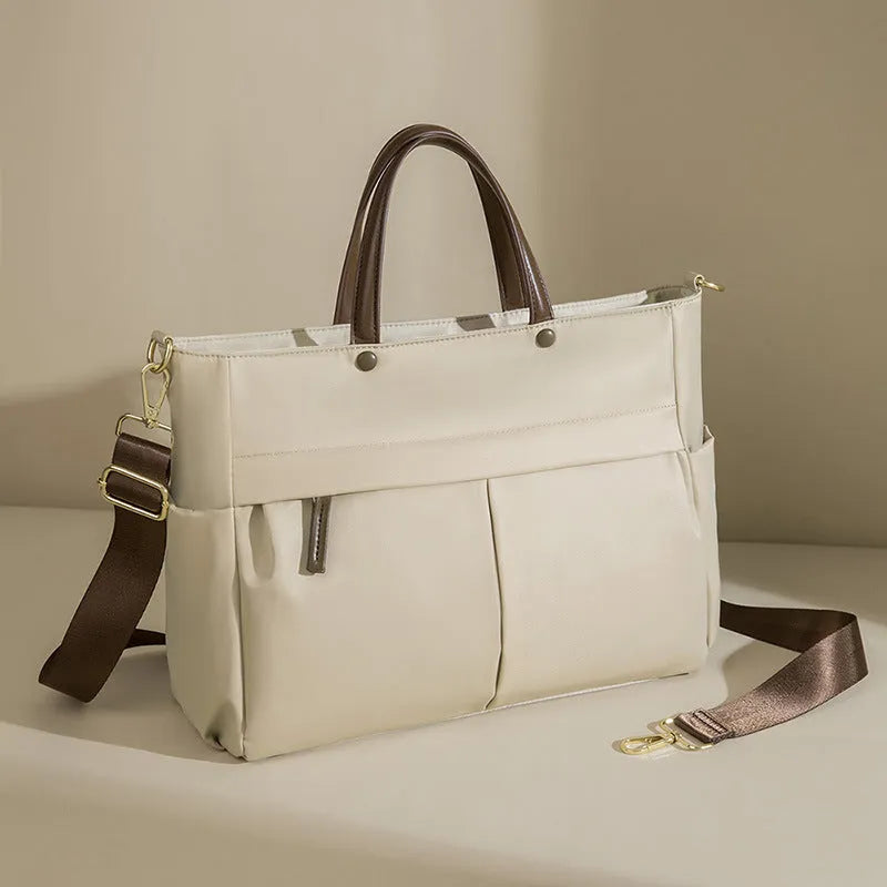 Women's urban simplicity style Oxford cloth laptop briefcase in elegant black with contrast stitching.