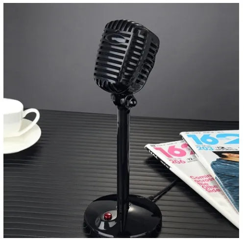 Black USB condenser microphone on an adjustable stand for computer recording and podcasting.
