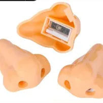 Flesh-colour plastic manual pencil sharpener with a large nostril and geometry-shaped body.