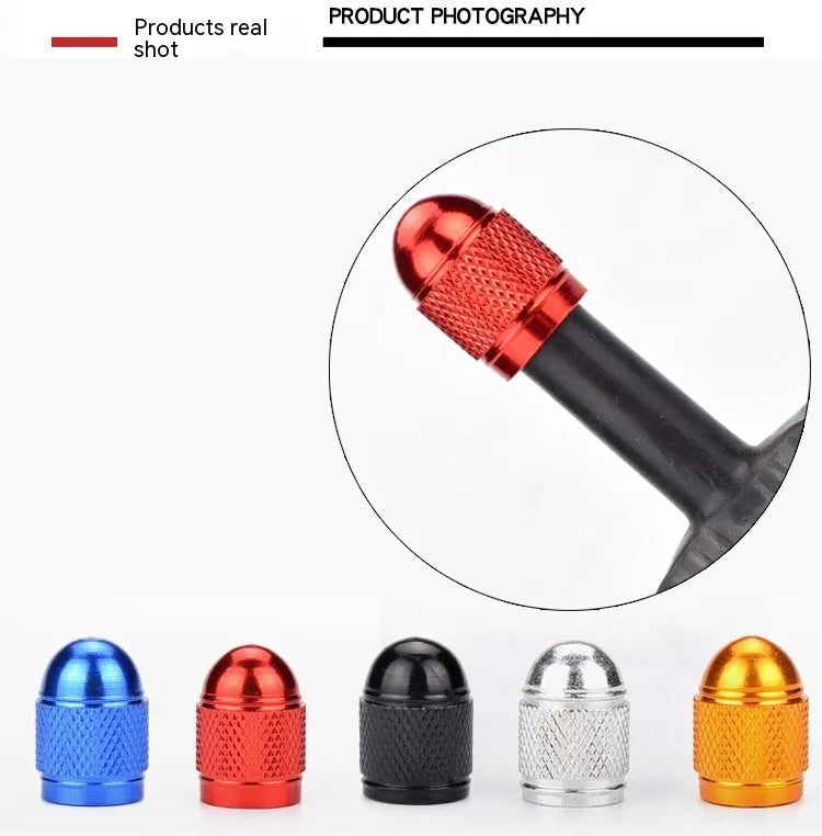 Aluminium mountain bike tyre valve cap in multiple colours on a Schrader valve.