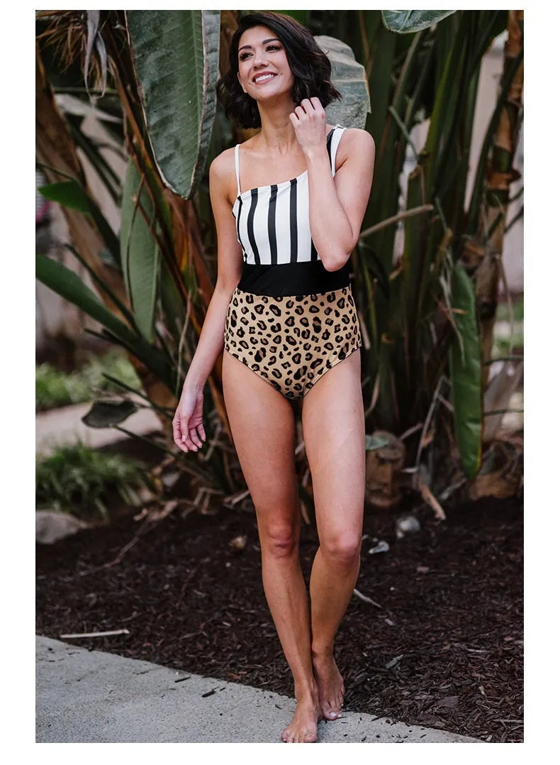 Women's leopard print one-piece swimsuit with an asymmetric collar and high-waisted brief cut.