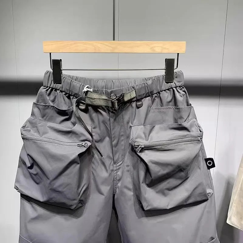 Men's large size work shorts with pockets in black or grey colours