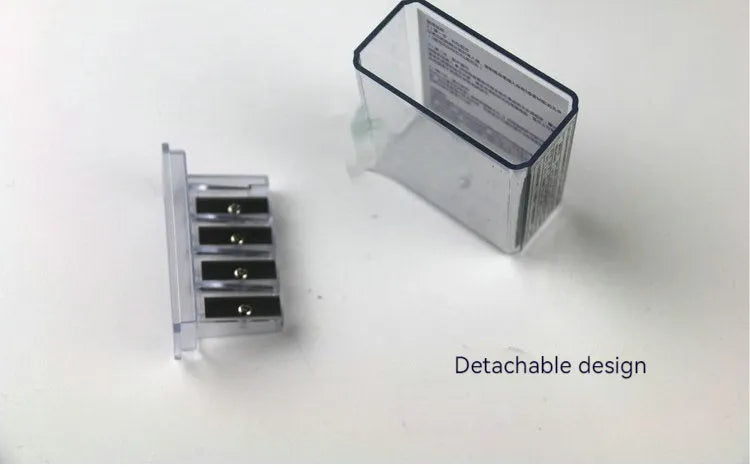 Geometric-shaped plastic pencil sharpener with four holes, four blades, and a screwdriver on a white background.