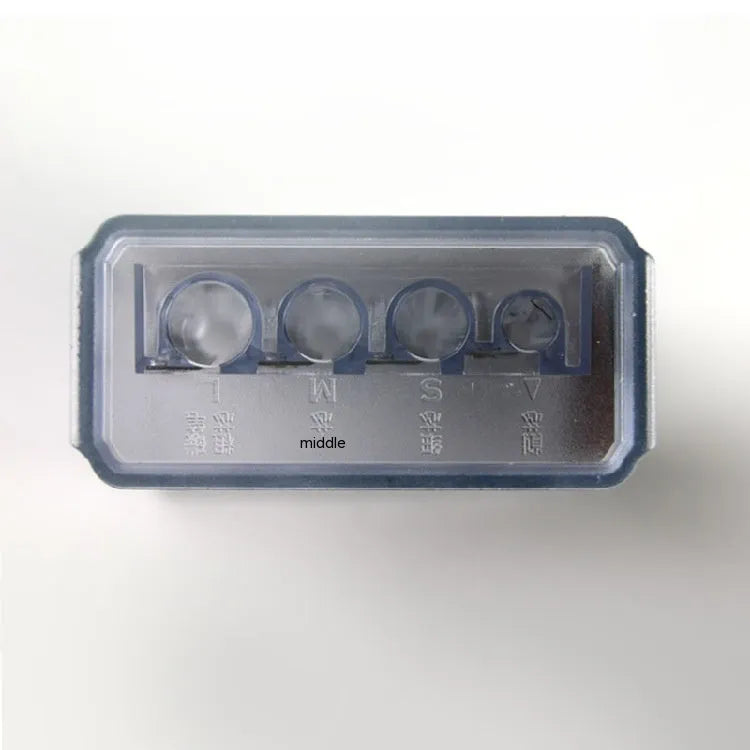 Geometric-shaped plastic pencil sharpener with four holes, four blades, and a screwdriver on a white background.