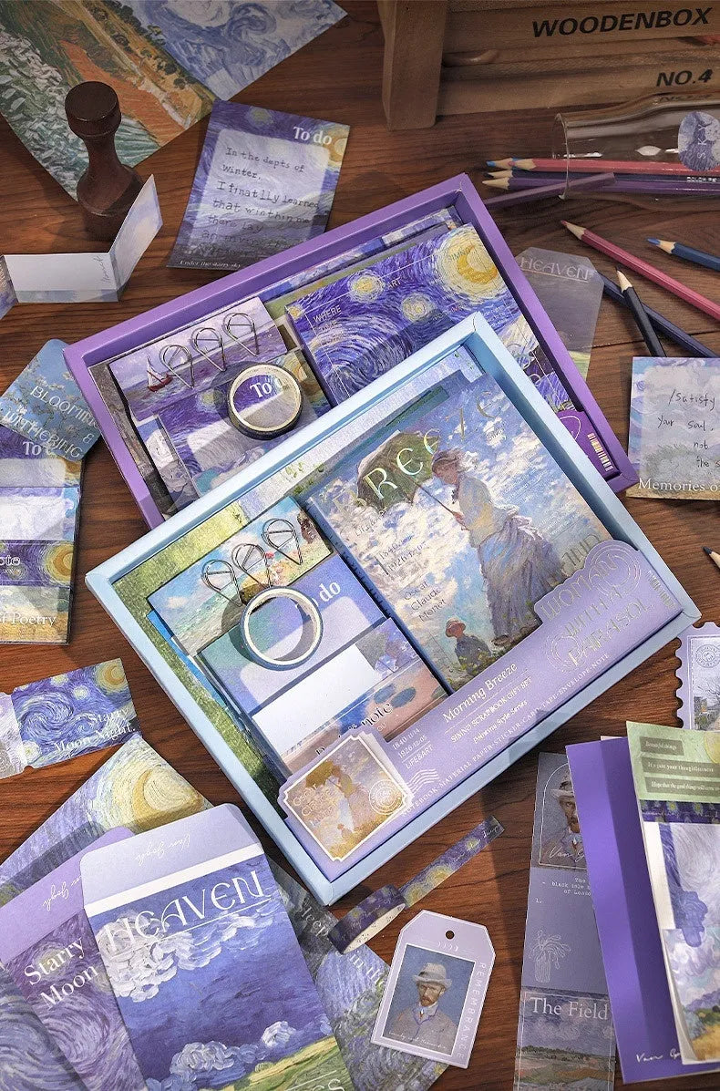Retro-style creative journal gift box open to show A6 grid notebook, material papers, cards, stickers, and a water drop bookmark.