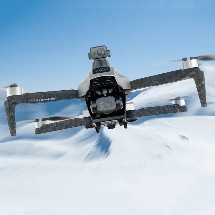 White folding quadcopter drone with camera and propellers, shown with remote control and shoulder bag.