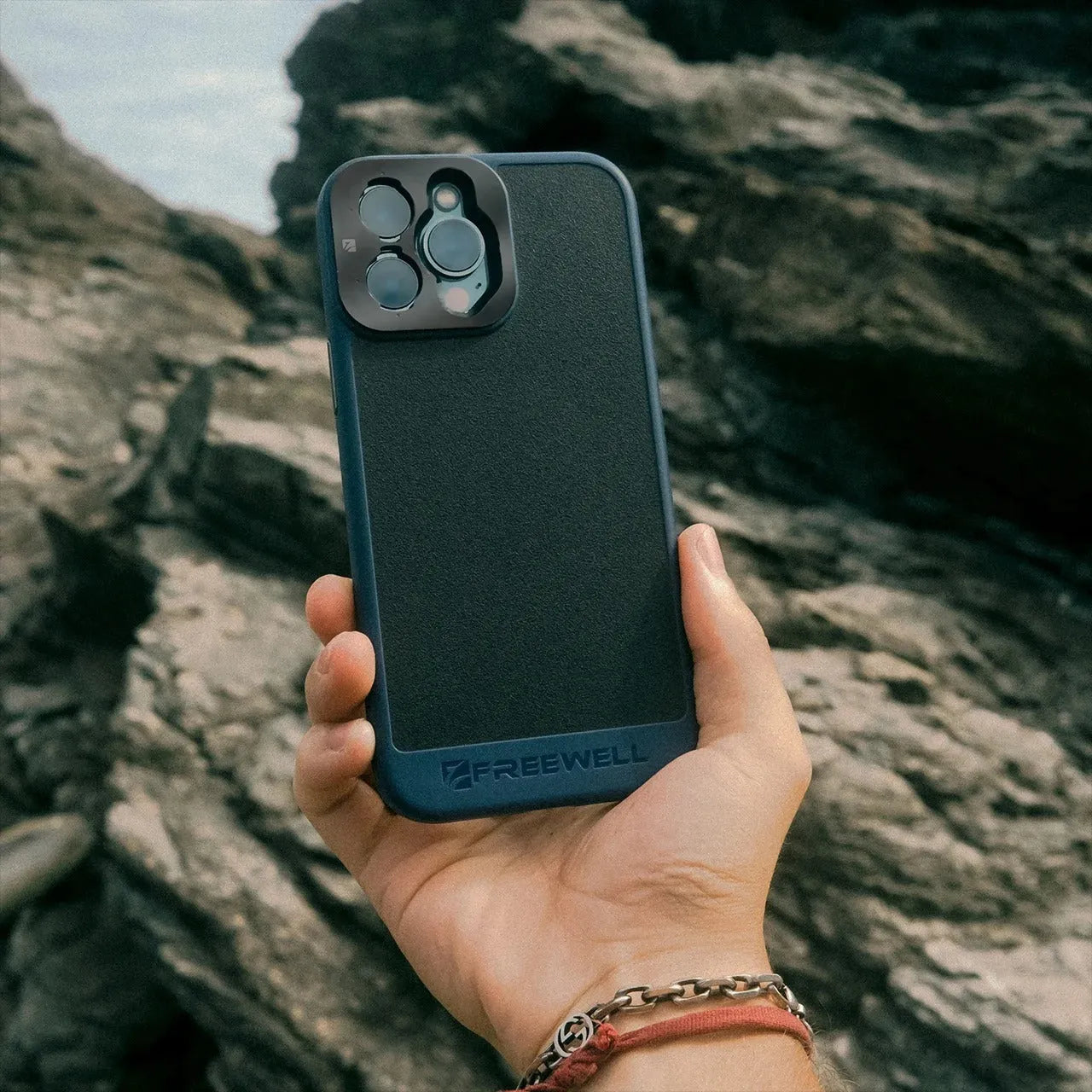 A Black protective phone case compatible with iPhone 13, 14, and 15 Pro and Pro Max models.