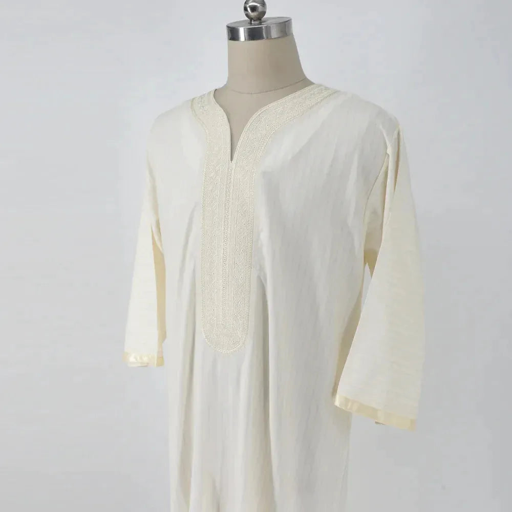 Men's ethnic style loose Muslim robe in milky white linen with short sleeves and national style embroidery, sizes M-4XL.