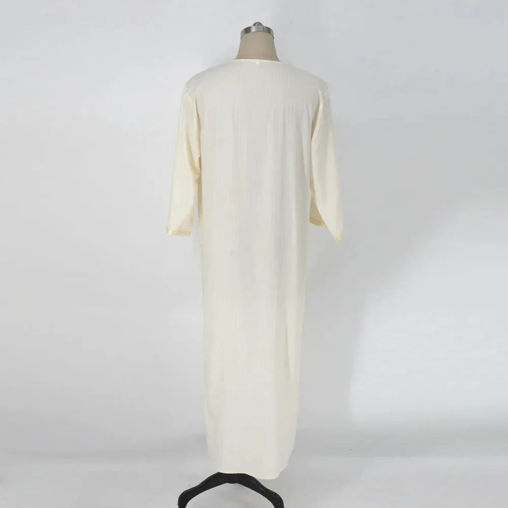 Men's ethnic style loose Muslim robe in milky white linen with short sleeves and national style embroidery, sizes M-4XL.